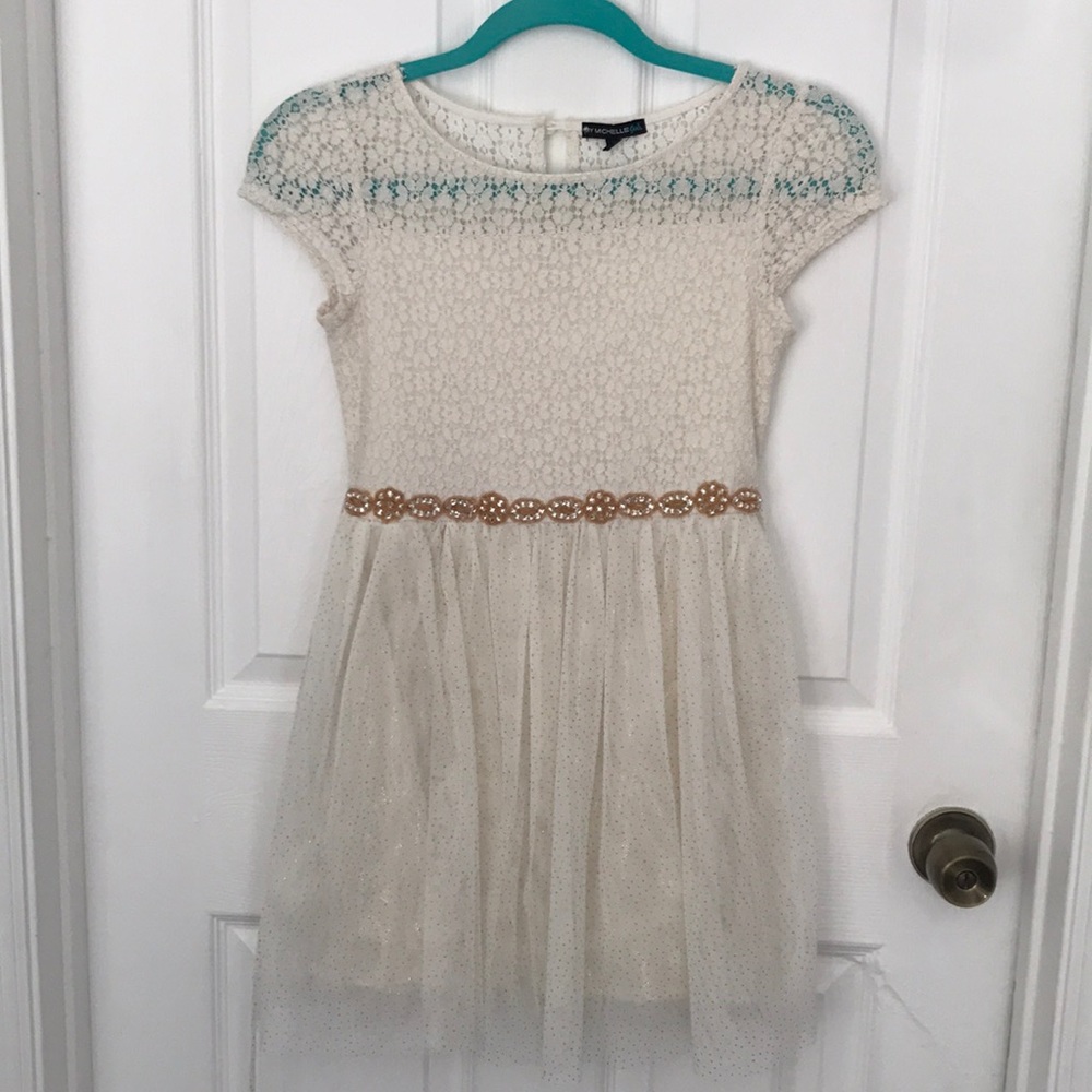 Cream lace dress by Michelle Girls.